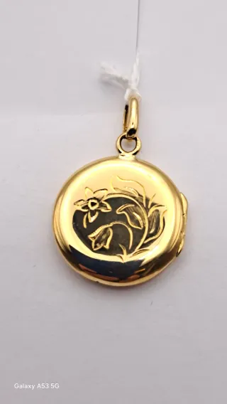 Colgante oro 18K guardapelos