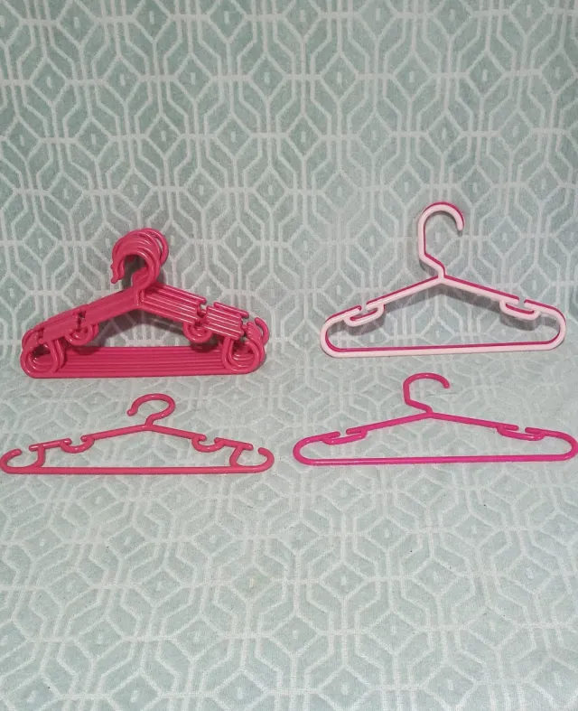 Perchas infantiles rosas (lote)