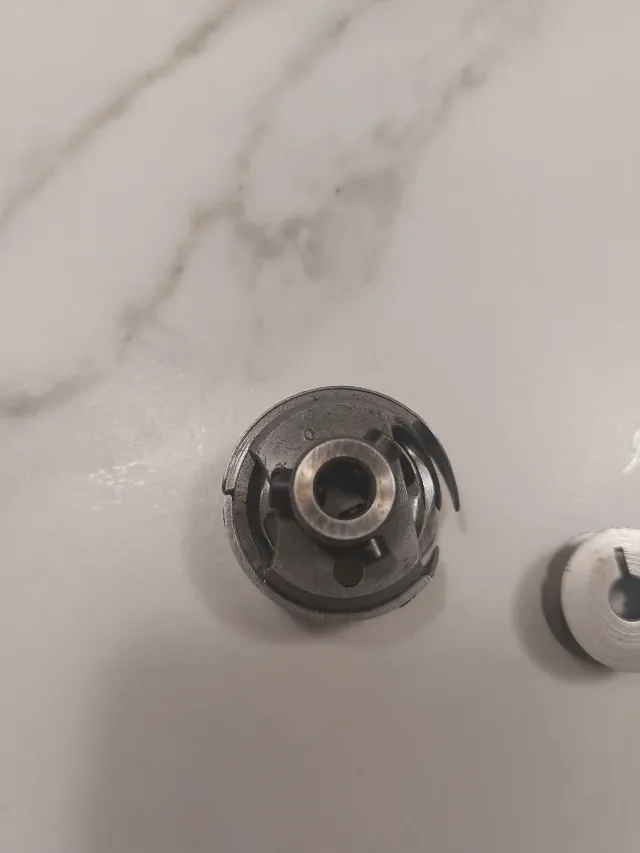 Garfio,canillero,canilla y cangrejo máquina coser