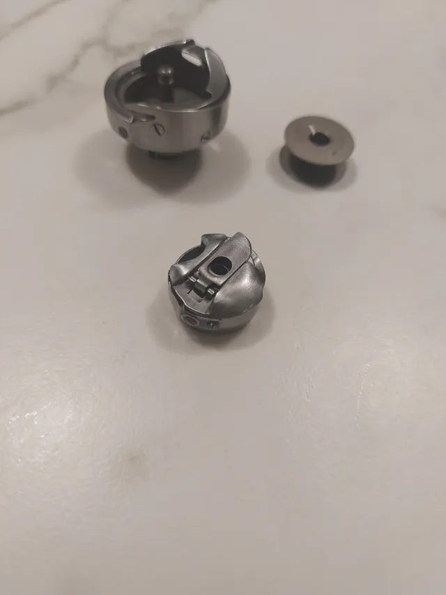 Garfio,canillero,canilla y cangrejo máquina coser