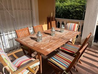 Mesa de madera acacia extens y 8 sillas plegables