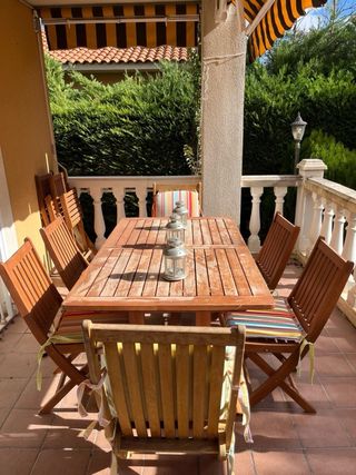 Mesa de madera acacia extens y 8 sillas plegables