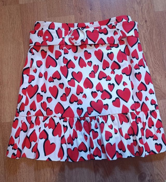 Falda Naf Naf con cinturón y volantes