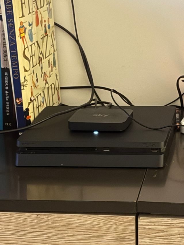 PlayStation 4 + joystick e giochi