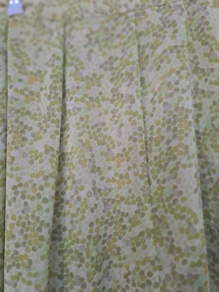 Falda midi Atian verde.