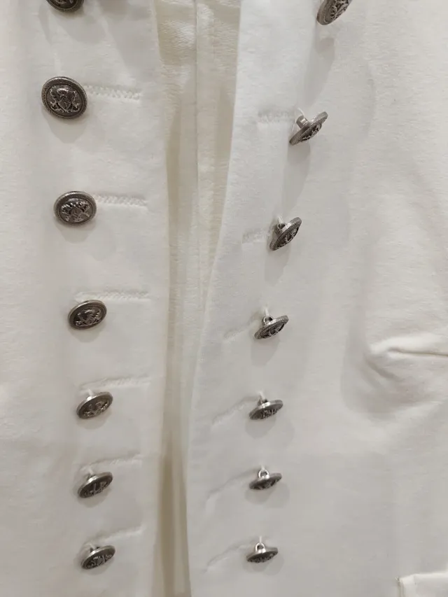 Americana de punto blanca