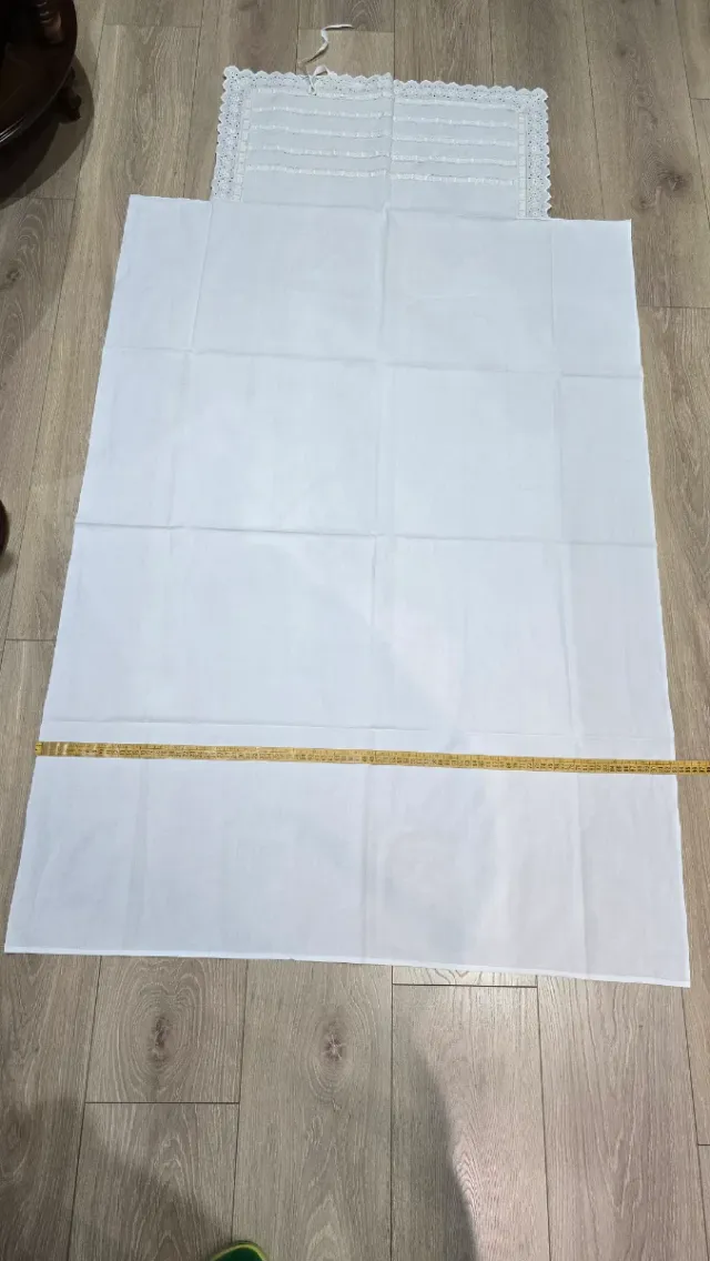 Sábana y almohada de cuna