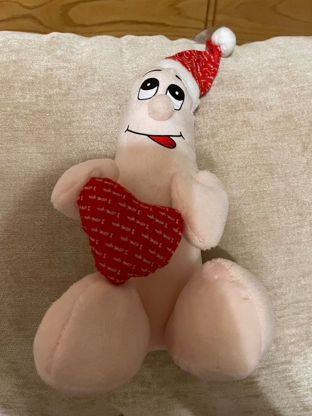 Peluche divertido con corazón y gorro de Navidad