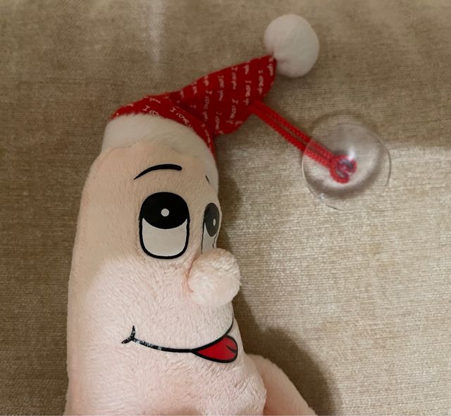 Peluche divertido con corazón y gorro de Navidad