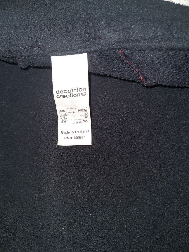 Chaqueta polar Quechua roja y negra para mujer