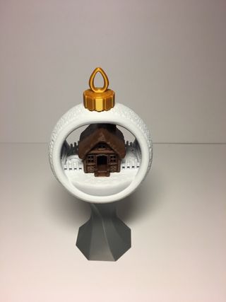 Pallina di Natale con casetta e recinto