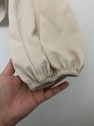 Blusa elegante manga larga drapeada