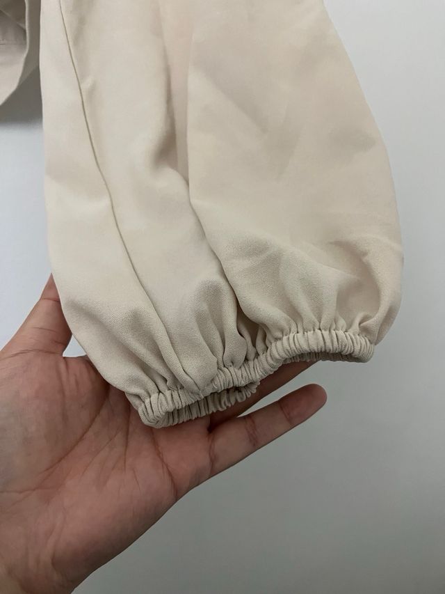 Blusa elegante manga larga drapeada