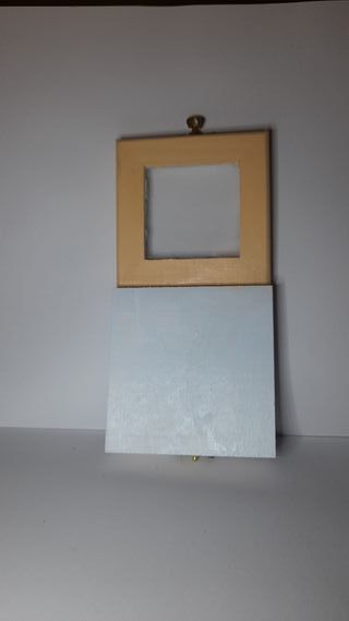 Scaffale in miniatura con 10 libri