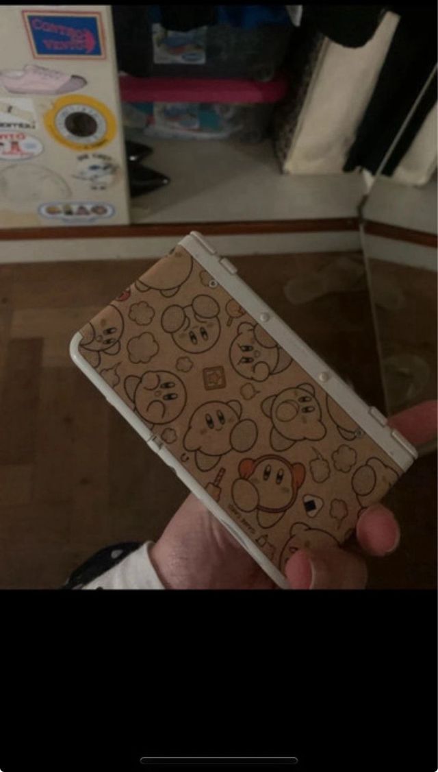 New Nintendo 3DS con cover Kirby