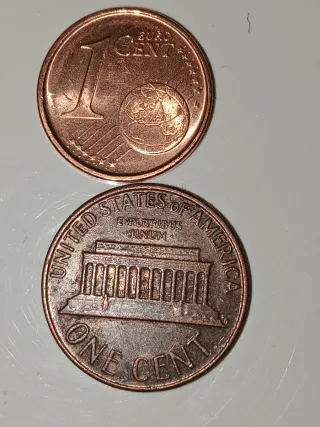 2 Monedas 1 Cent 1999 España S/C y 1 cent 1977 .