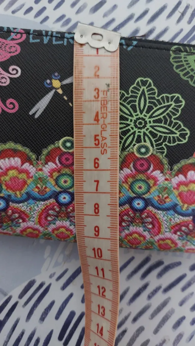 Cartera monedero con estampado étnico desigual