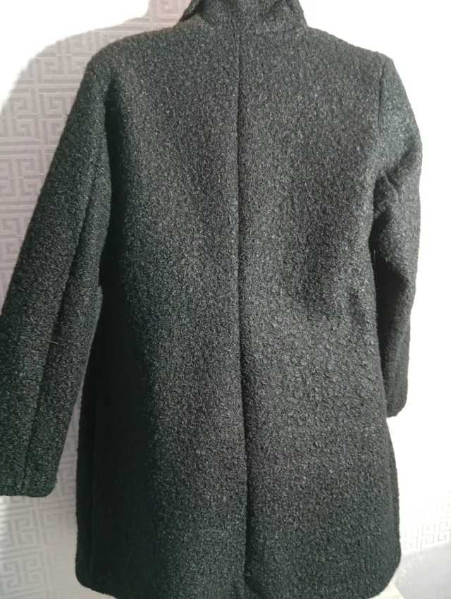 Chaquetón pelo rizado negro..está intacta