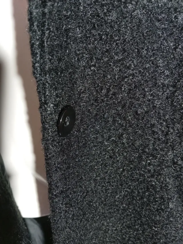 Chaquetón pelo rizado negro..está intacta