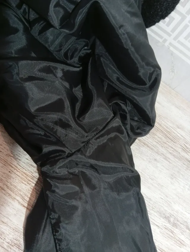 Chaquetón pelo rizado negro..está intacta