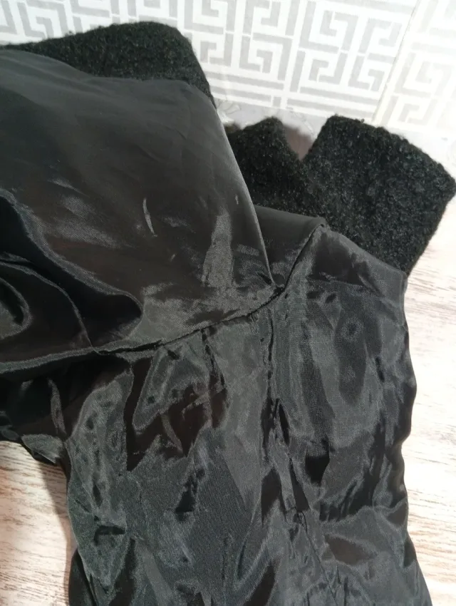 Chaquetón pelo rizado negro..está intacta