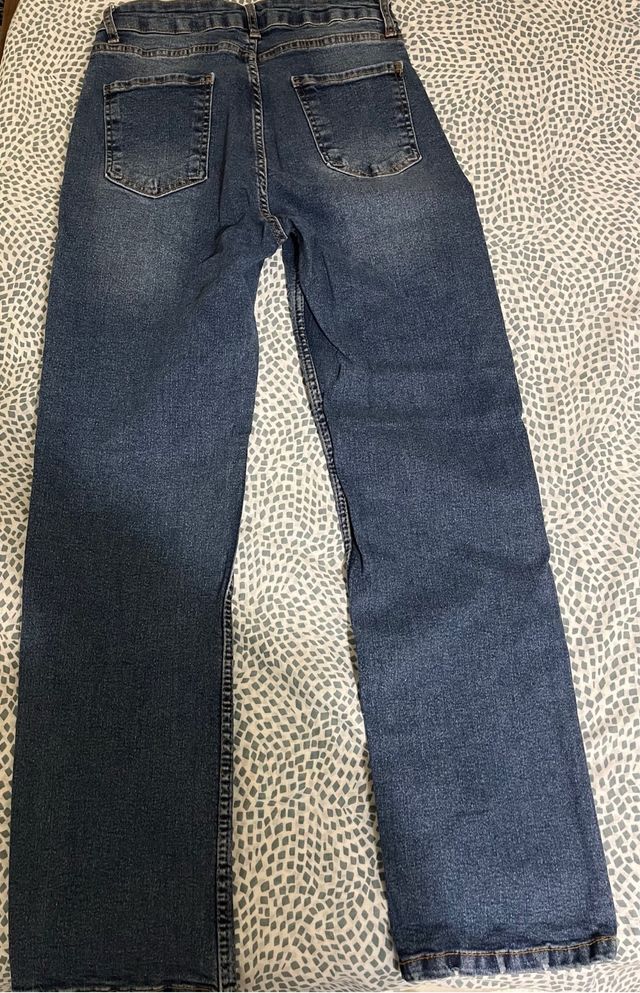 Vaqueros azules de tiro alto