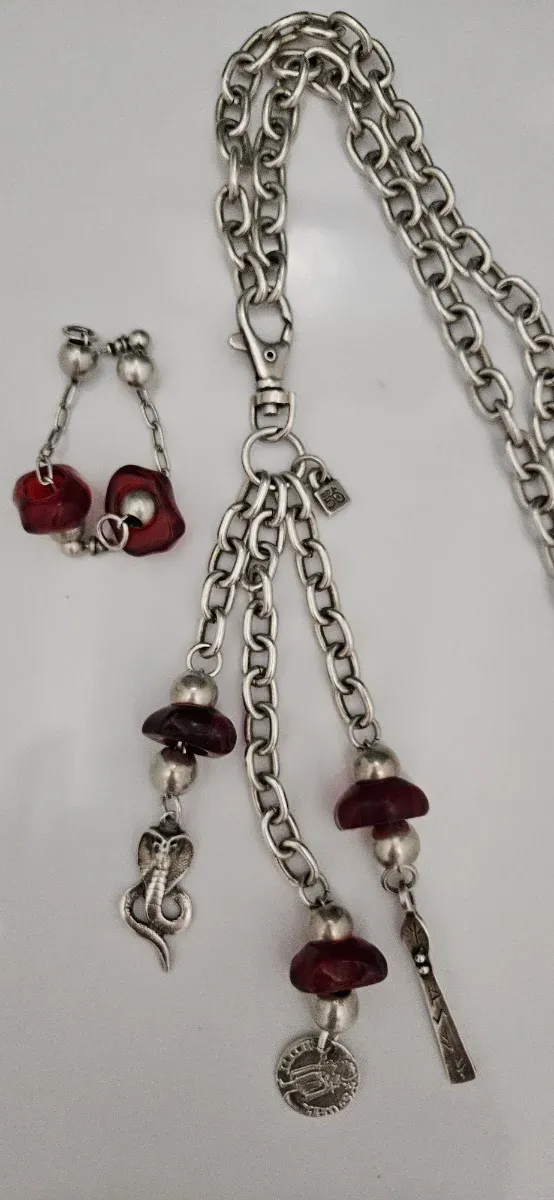 Conjunto collar y pendientes Uno de 50