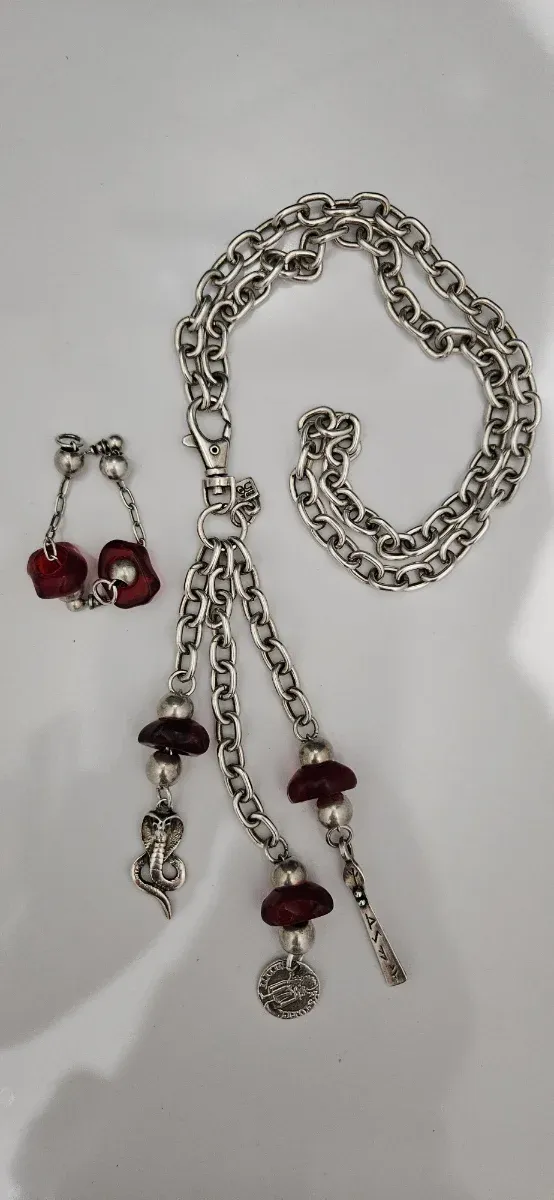 Conjunto collar y pendientes Uno de 50