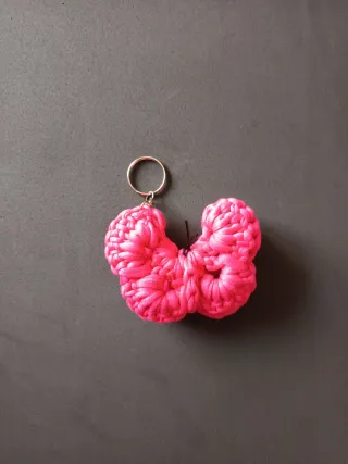 Portachiavi a forma di farfalla fucsia