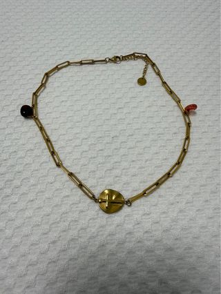 Collar cruz dorado con piedras