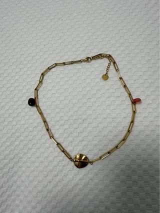 Collar cruz dorado con piedras