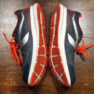 Zapatillas Kalenji Negras y Naranjas