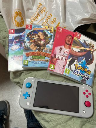 Nintendo Switch Lite Gris + juegos más fundas 