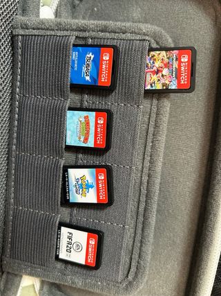 Nintendo Switch Lite Gris + juegos más fundas 