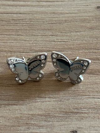 Pendientes mariposa Guess plateados