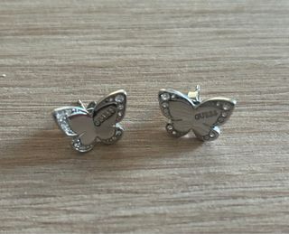 Pendientes mariposa Guess plateados