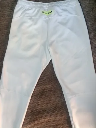 Pantalón chándal Nike gris y blanco