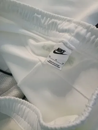 Pantalón chándal Nike gris y blanco