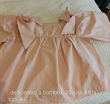 Blusa rosa con lazos