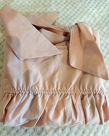 Blusa rosa con lazos