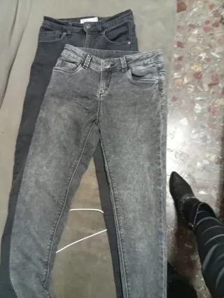 Pantalones vaqueros grises y negros talla 34