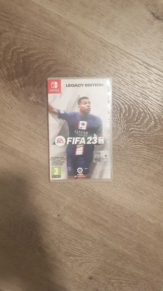 Nintendo Switch + FIFA 23 Legacy Edition