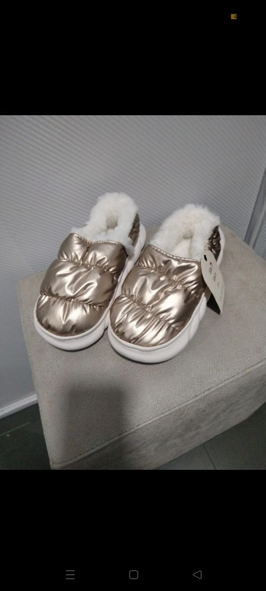 Pantuflas doradas Tex
