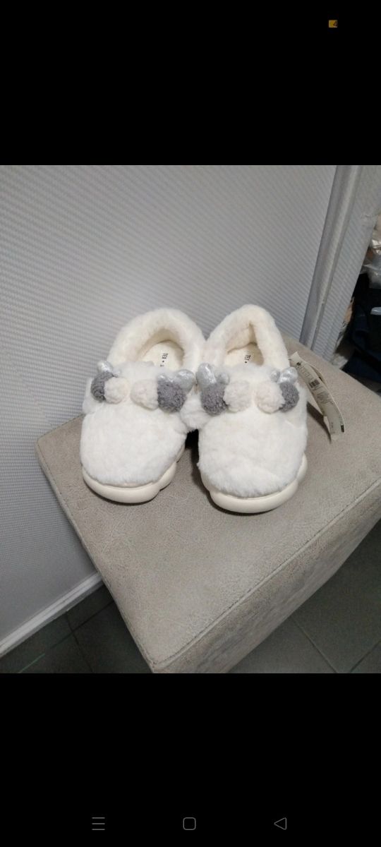 Pantuflas blancas Tex