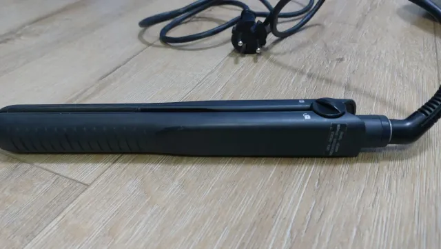 Plancha de pelo Remington negra y plateada