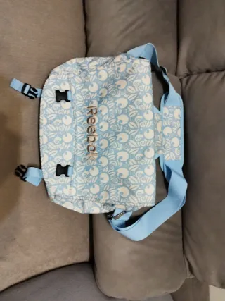 Bolso portátil Reebok azul y blanco