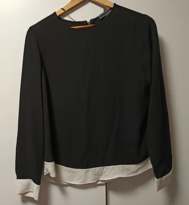 Blusa negra y blanca