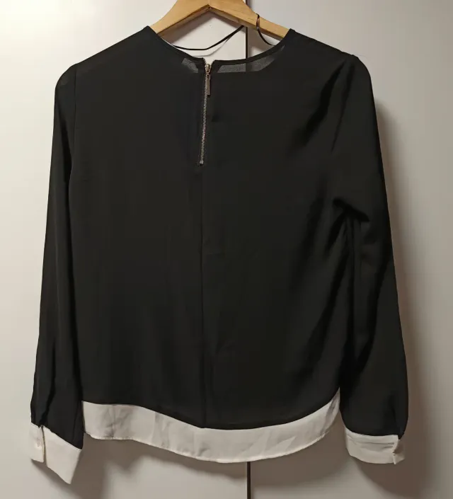 Blusa negra y blanca