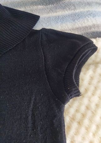 Vestido negro tejido cuello alto