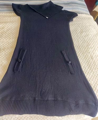 Vestido negro tejido cuello alto